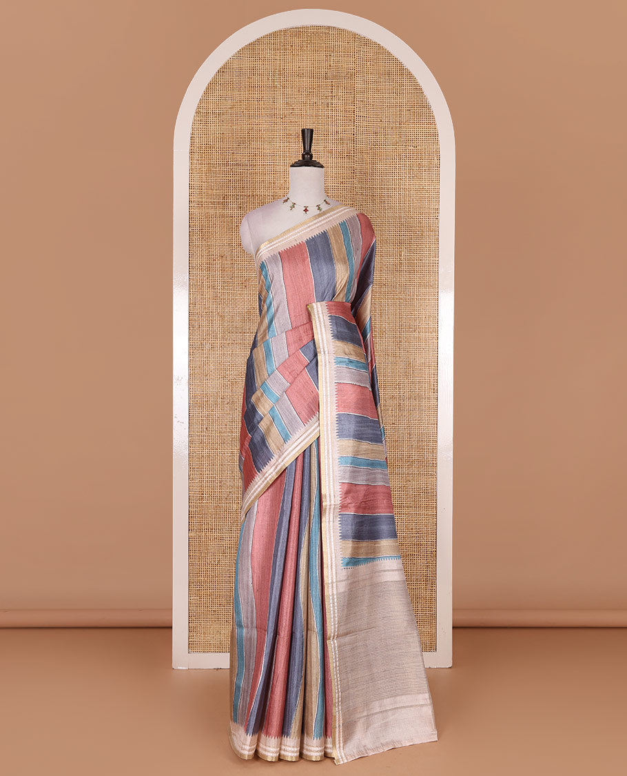 Multi color vertically striped semi-tussar saree, contrast resham thread border of temple and rudraksham motifs, striped pallu, and contrast striped printed blouse