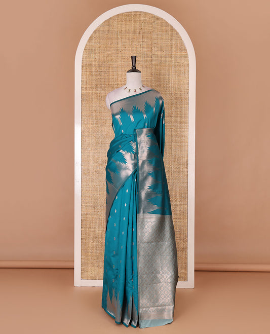 Rama Green zari buttas kanchi silk saree, temple zari border, zari-rich jaal pallu, and zari motifs woven blouse