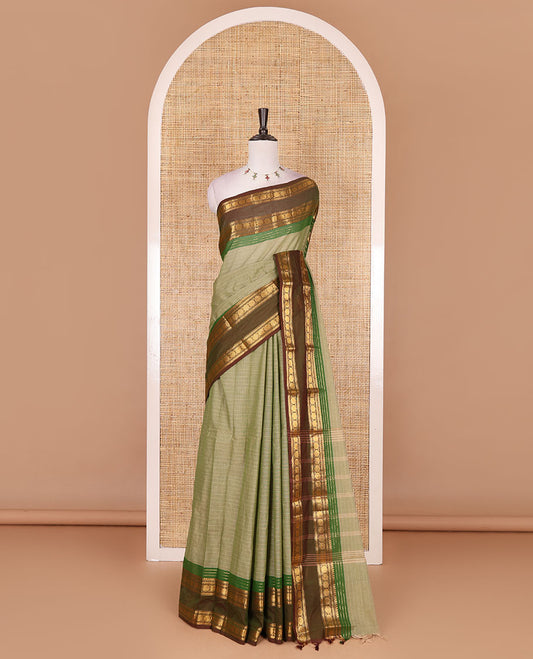 Green striped Chettinad cotton saree, contrast rettai rettu rudraksham motif zari border, striped pallu, and matching blouse