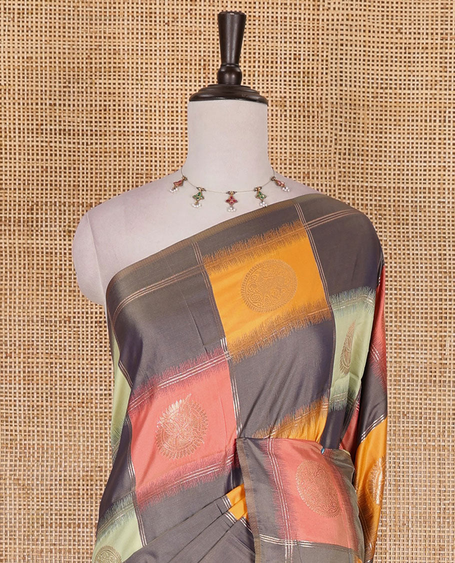 Borderless grey chakra buttas enclosed, checked elite soft silk saree, contrast ogee patterned pallu, and contrast zari design blouse