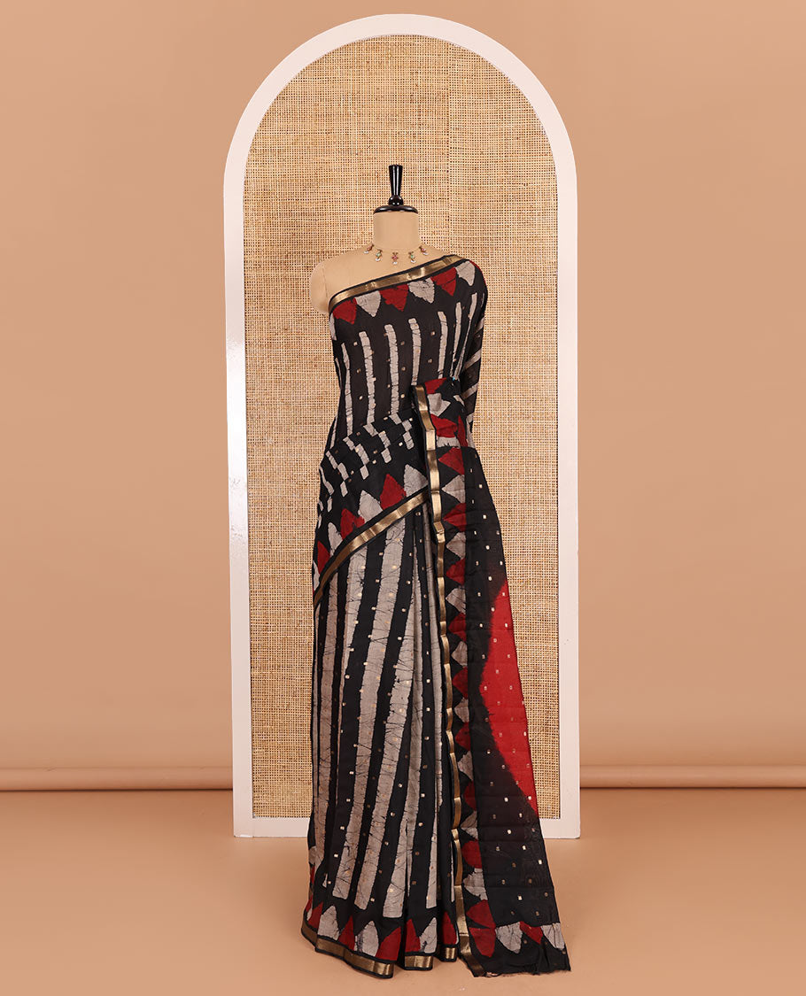 Black batik printed with zari buttas woven chanderi cotton saree, piping zari border, big circle printed pallu, and contrast zari buttas blouse