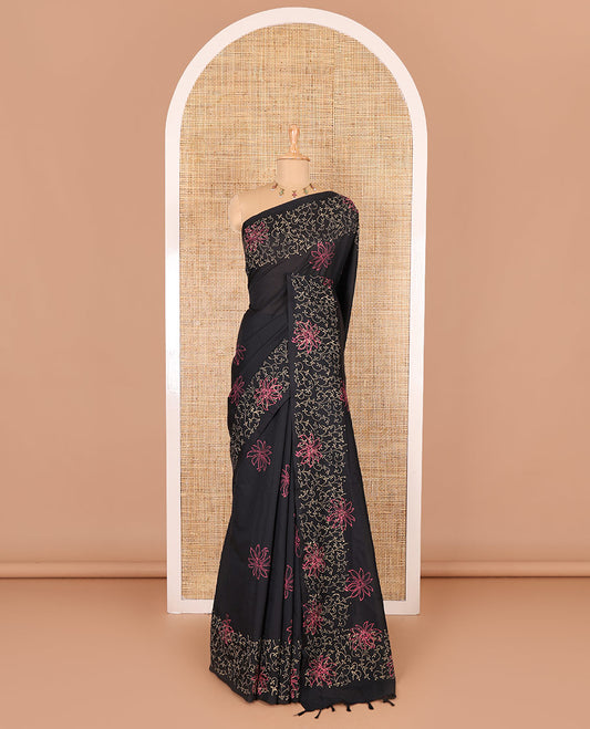 Black floral block printed South cotton saree, floral vine block printed border, floral printed pallu, and a matching blouse and a contrast floral motifs printed blouse