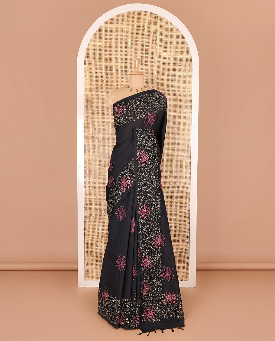 Black floral block printed South cotton saree, floral vine block printed border, floral printed pallu, and a matching blouse and a contrast floral motifs printed blouse