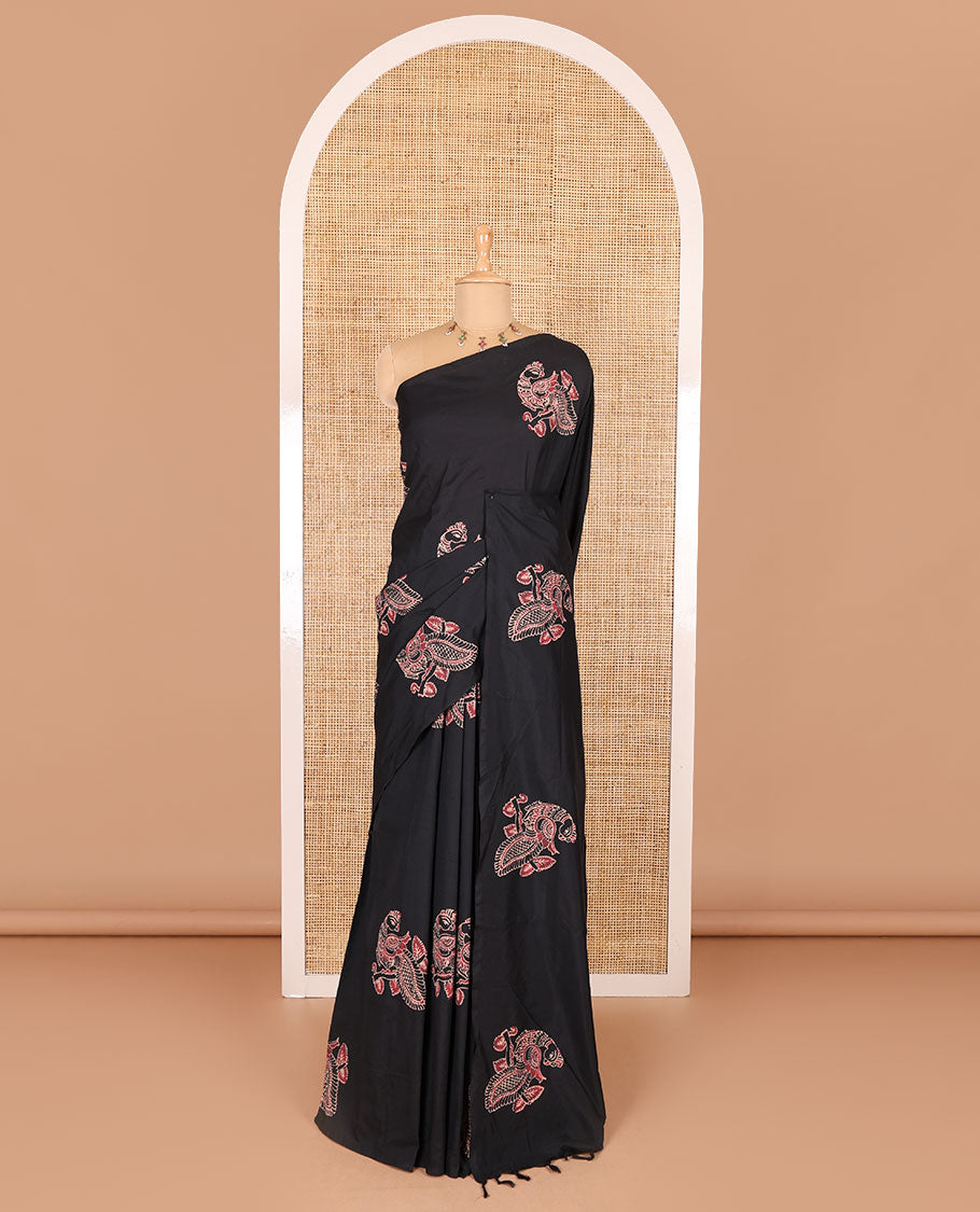 Borderless black peacock motifs printed South cotton saree with a matching blouse, and a contrast floral motifs printed blouse