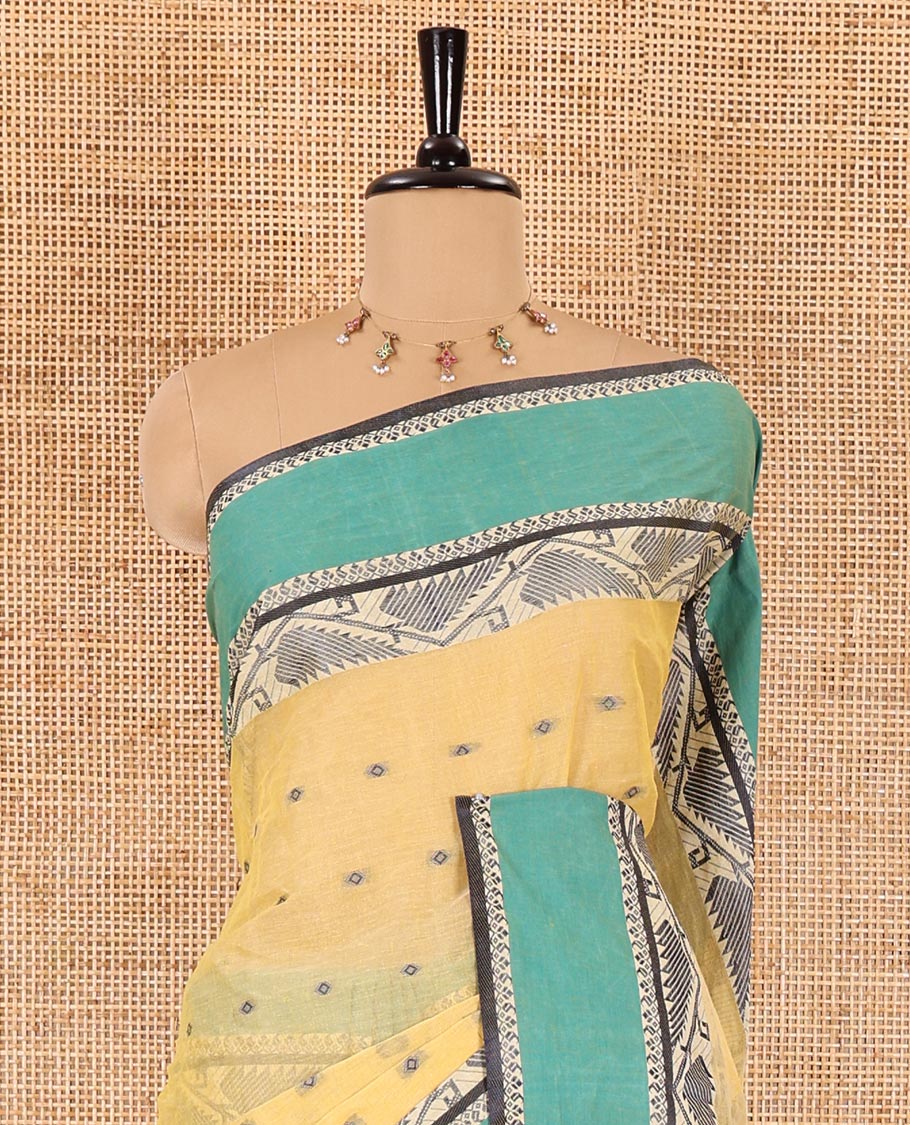 Yellow buttas Bengal cotton saree, contrast jamdani floral creeper design, and pallu of stripes, and buttas