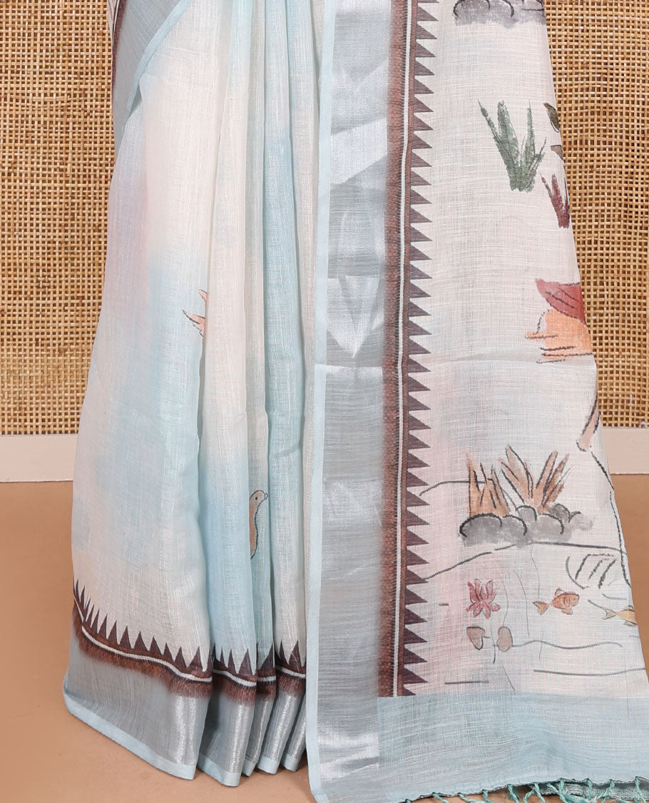 Sky blue nature-theme printed linen cotton saree features flora-fauna motifs, temple bavanji border, nature printed pallu, and a floral motif printed blouse