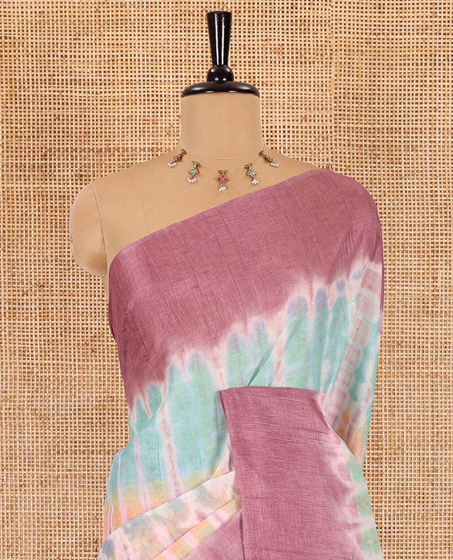 Multi color shibori printed jute tussar saree, contrast plain border, plain pallu with tussels, and contrast plain blouse