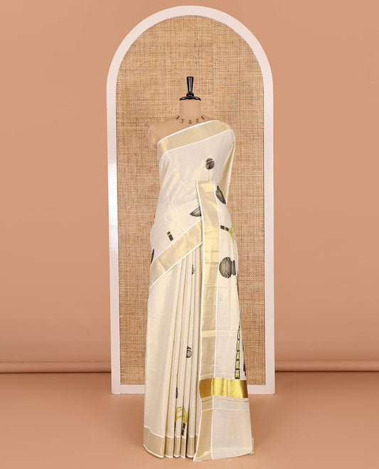 Cream-black Pongal-festive theme block printed Kerala cotton saree, pongal pot printed body, bavanji border, and Pongal theme block print pallu, and a matching blouse