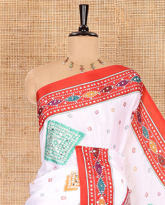 White and red colorful bandhani buttas printed and mirror-work masakali saree, contrast ogee printed and mirror-work border, kaleidoscopic colored printed and mirror-work dupatta