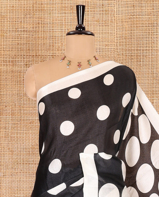 Borderless cream-black polka dots printed art khadi cotton saree, pallu of big and small coin-size polka dots print, and a small dots printed blouse