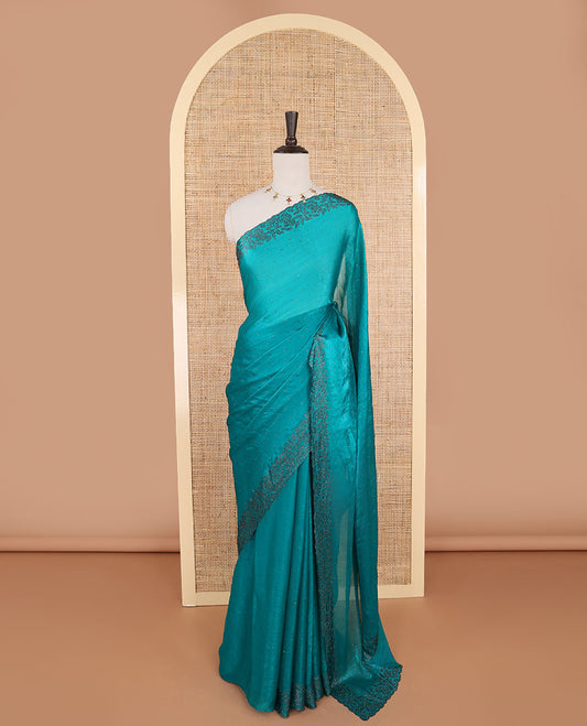 Rama green swarovski stone work fendy crepe saree with swarovski stone work border & self pallu along with plain blouse, swarovski stone work sleeve