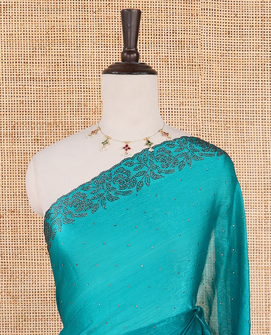 Rama green swarovski stone work fendy crepe saree with swarovski stone work border & self pallu along with plain blouse, swarovski stone work sleeve