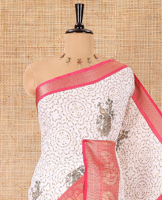Cream and rani pink bandhani dots and peacock motifs printed dola crush saree, contrast zari peacock border, pallu of abstract peacock print, and a zari design blouse