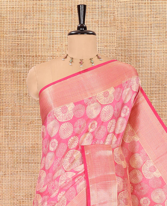Pink lotus-leaf style printed semi-tussar saree, traditional zari border, zari striped pallu, and a matching blouse