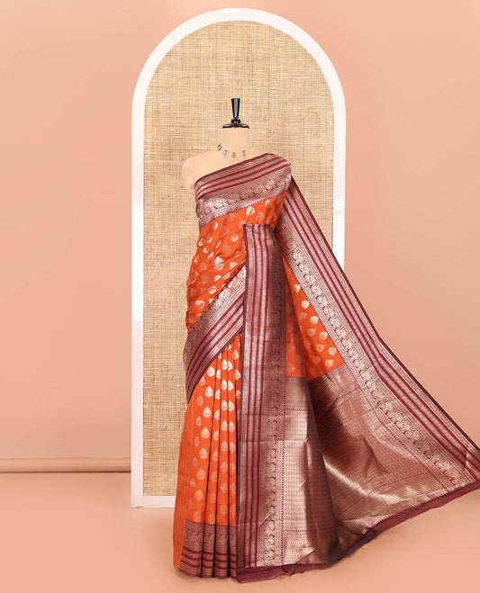 Rust orange zari buttas kanchi silk saree, contrast traditional zari border of peacock designs, intricate pallu, and a zari design pallu