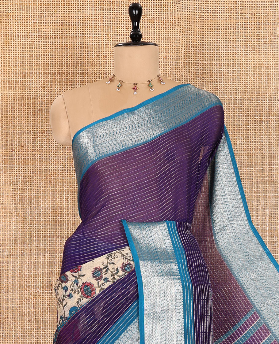 Dark Violet Viscose Georgette Elevated with Horizontal Zari Stripes and Kalamkari Flora-Fauna Prints, Complemented by a Contrast Traditional Zari Border, a Printed Pallu with Stripes, and a Contrast Blouse