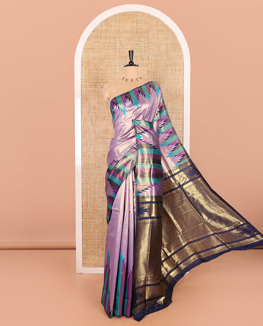 Gleaming Lavender Plain Khadi Tissue Silk Saree Featuring a Contrast Tissue Temple Border, Grand Pallu of Zari Jaal Design, and Paired with a Contrast Blouse of Zari Buttas
