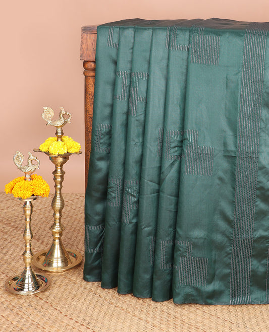 Dark green neem zari design litchi soft silk saree with self border & neem zari design pallu along with plain blouse