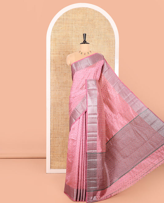Light Pink Semi Tussar Saree Adorned with Zari Buttas All Over the Body, a Hazily Woven Border of Traditional Designs, Pallu Steeped with Zari Buttas and Zari Stripes, and Paired with a Matching Blouse