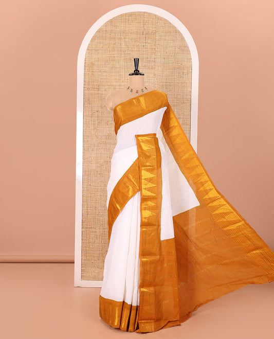 Off-White and Mustard Plain Sungudi Cotton Saree Accentuated with a Contrast Border of Temple and Zari Checks Designs, Subtly Zari Striped Pallu, and Paired with a Contrast Blouse