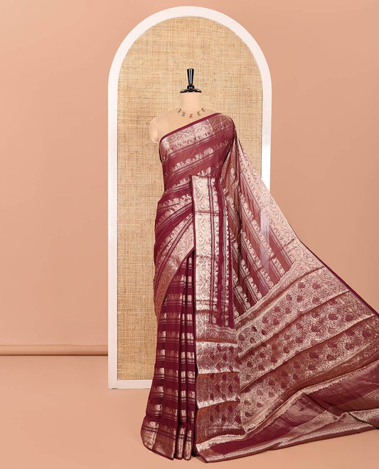 Purple Georgette Saree, Accentuated with Zari Peacock Designs All Over Its Body, Highlighted by a Traditional Zari Border, Gracefully Zari-Decked Pallu, and Paired with a Matching Brocade Blouse
