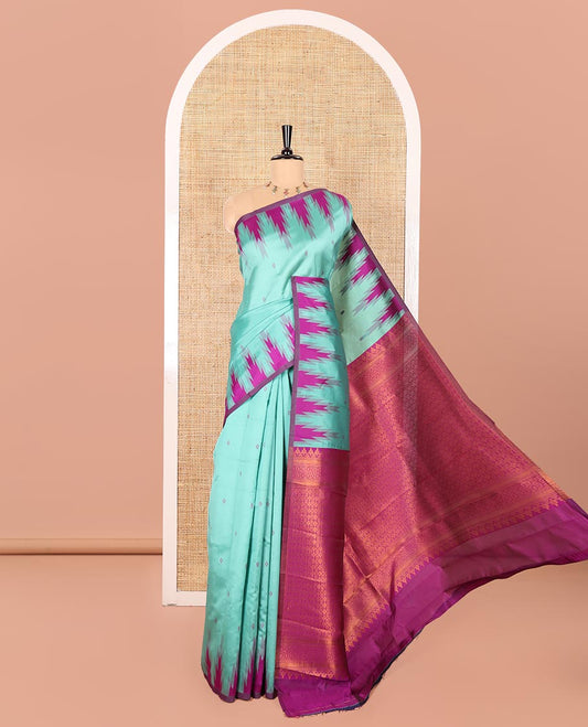 Green Kanchi Silk Saree Woven with Thread Buttas All Over Its Body, Complemented by a Contrast Temple Border, Grandly Woven Pallu of Intricate Design Weave, and Paired with a Contrast Blouse