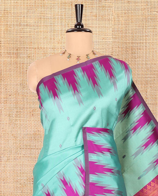 Green Kanchi Silk Saree Woven with Thread Buttas All Over Its Body, Complemented by a Contrast Temple Border, Grandly Woven Pallu of Intricate Design Weave, and Paired with a Contrast Blouse