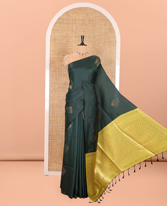 Borderless Bottle Green Semi-Soft Silk Saree, Embellished with Kolam Zari Buttas All Over Its Body, Complemented by a Contrast Grandly Woven Pallu of Jaal Designs, and Paired with a Contrast Blouse