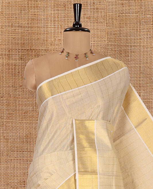 Gold Kerala Cotton Saree, Gleamed Up with Medium-Sized Checks All Over Its Body, Subtle Bavanji Border, Scintillating Zari Design Pallu, and Paired with a Matching Blouse