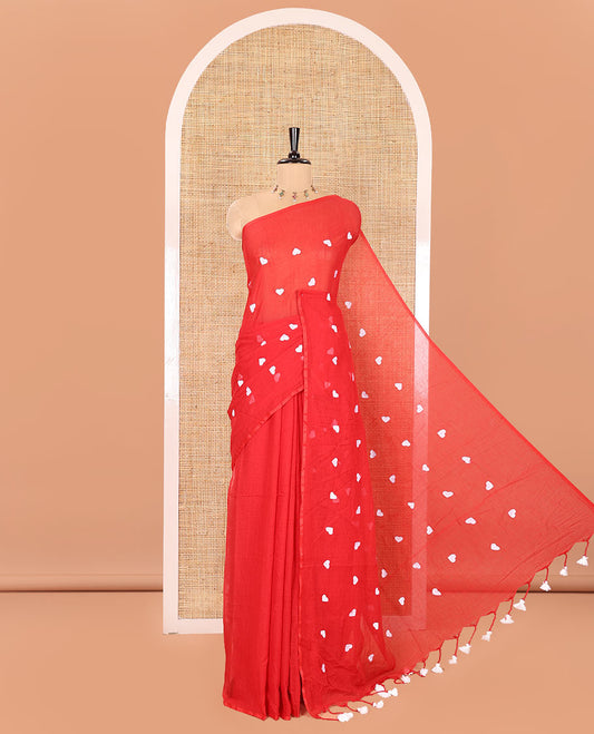 Borderless Red Khadi Mul Cotton Saree, Artfully Designed with Heart Motifs Embroidery Across Its Body, Pallu mirrors the Same Design, and Paired with a Matching Blouse
