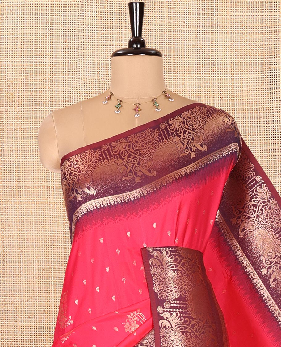 Rani Pink Elite Soft Silk Saree, Enriched with Zari Buttas on Its Body, Complemented by a Contrast Peacock-Floral Zari Blouse, Intricately Designed Pallu, and Paired with a Contrast Blouse
