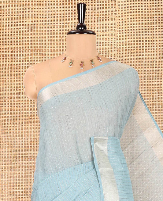 Rama Green Linen Zari Cotton Saree, Gleamed Up with Zari Stripes All Over Its Body, a Subtle Zari Border, a Self-Pallu, and Comes Without a Blouse