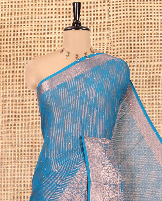 Blue Chiffon Saree, Richly Elevated with Ikat-Style Weave and Stonework, a Traditional Border, a Floral Design Pallu, and a Matching Blouse