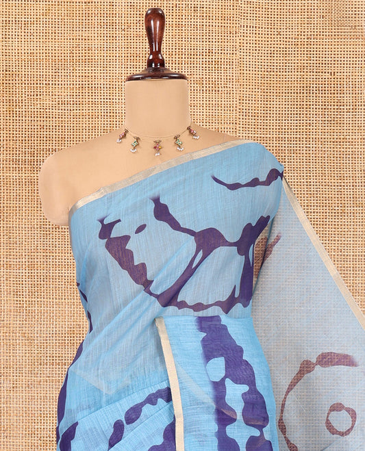 Blue Linen Cotton Saree, Adorned with Shibori Print, Gold Piping Border, Contrast Floral Printed Pallu, and Contrast Floral Printed Blouse