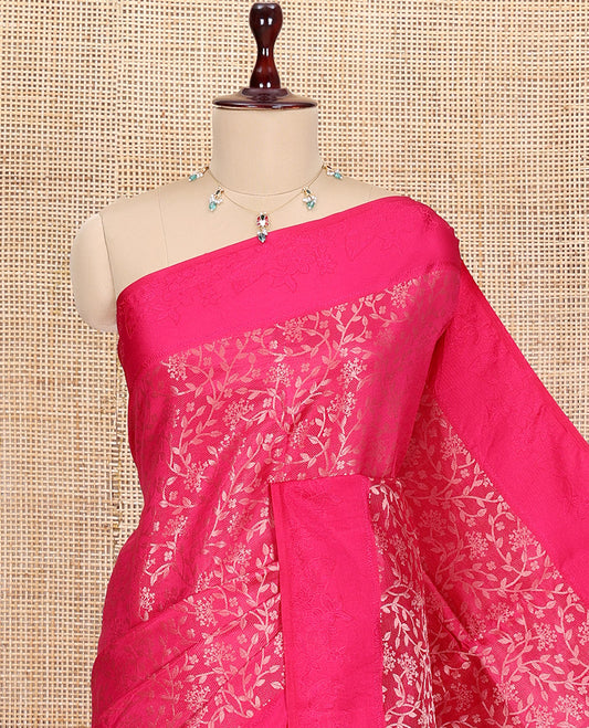 Rani Semi-Tussar Saree, Embellished with Floral Jacquard Design, an Embossed Border, a Floral Pallu, and a Matching Blouse