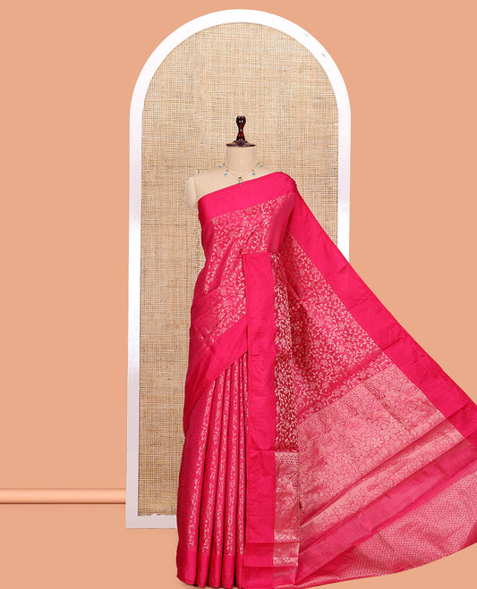 Rani Semi-Tussar Saree, Embellished with Floral Jacquard Design, an Embossed Border, a Floral Pallu, and a Matching Blouse