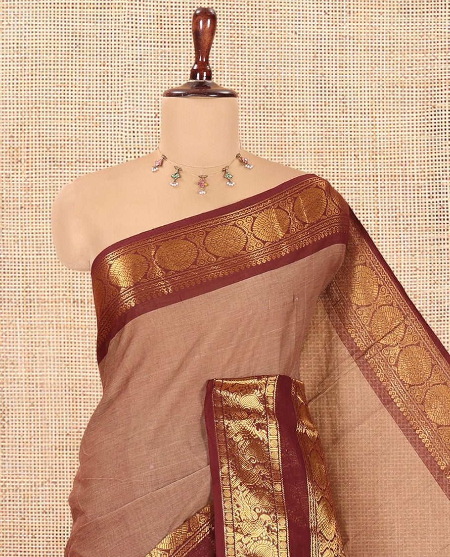 Brown Plain Chettinad Cotton Saree, Complemented by a Contrast Peacock-Chakram Rettai Pettu Border, and a Matching Blouse