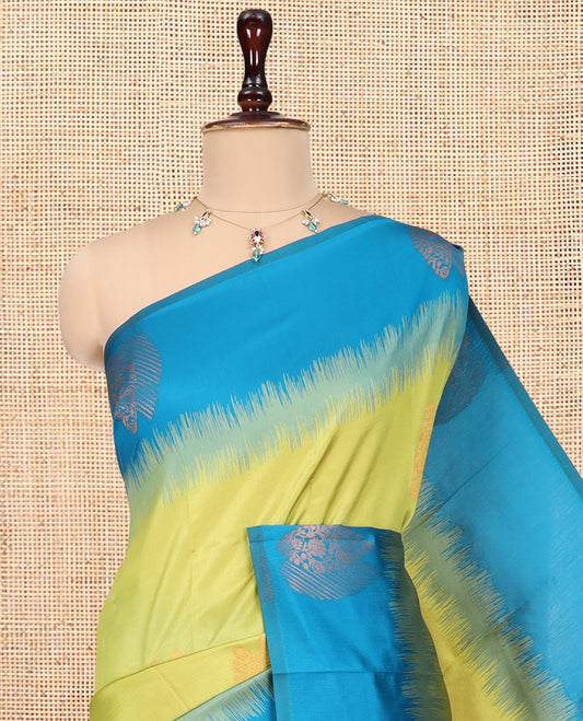 Parrot Green Kanchi Silk Saree, Adorned with Zari Buttas, a Contrast Zari Butta Border, Grand Pallu, and a Contrast Blouse