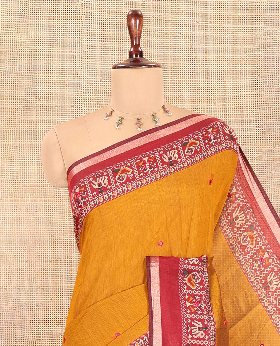 Mustard Manipuri Tussar Saree, Delicately Woven with Mirror Work, a Contrast Patola Animal Motif Border, Patola Pallu, a Contrast Blouse