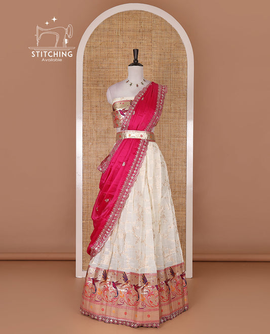 Cream banaras halfsaree, jaal jacquard skirt, contrast green paithani border, matching blouse, and Syska georgette embroidered dhavani