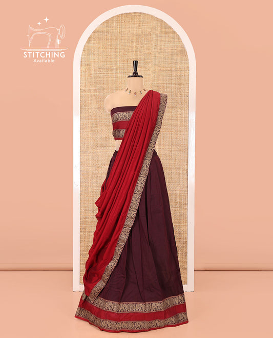 Wine-Red Mercerised Cotton Half-Saree Half-Saree Features Plain with Contrast Rettai Pettu Elephant-Chakram Bordered Skirt, Paired with a Matching Blouse, and Comes with a Contrast Elephant-Chakram-Bordered Dhavani