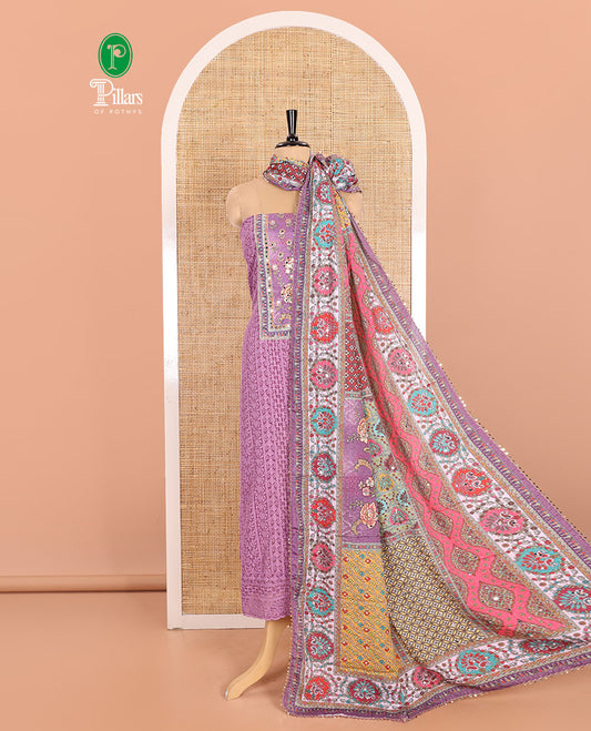 Purple Material Chudidar Set Adorned with Schiffli Embroidery Georgette Top, Subtly Made Plain American Crepe Bottom, and Chinon Dupatta Featuring Kaleidoscopic-Colored Floral, Geometric, and Mughal Motifs Print and Mirror Work
