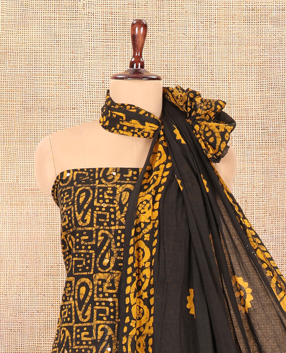 Black-Mustard Cotton Material Churidar Set, Paisley Batik Printed Top, a Matching Bottom, a Batik Printed Dupatta
