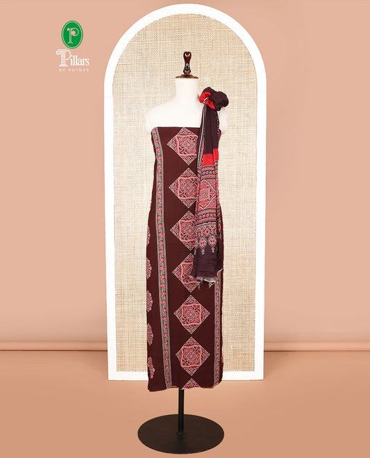 Brown ajrak print rayon chudidhar material top with rayon material printed pant & mul mul votton ajrak printed dupatta