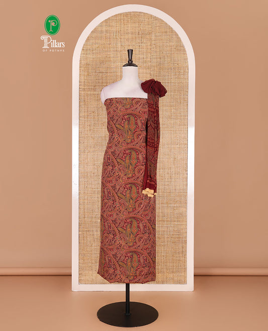 Reddish maroon Italian crepe material chudidar set, paisley printed top, plain bottom, and floral-paisley printed georgrette dupatta