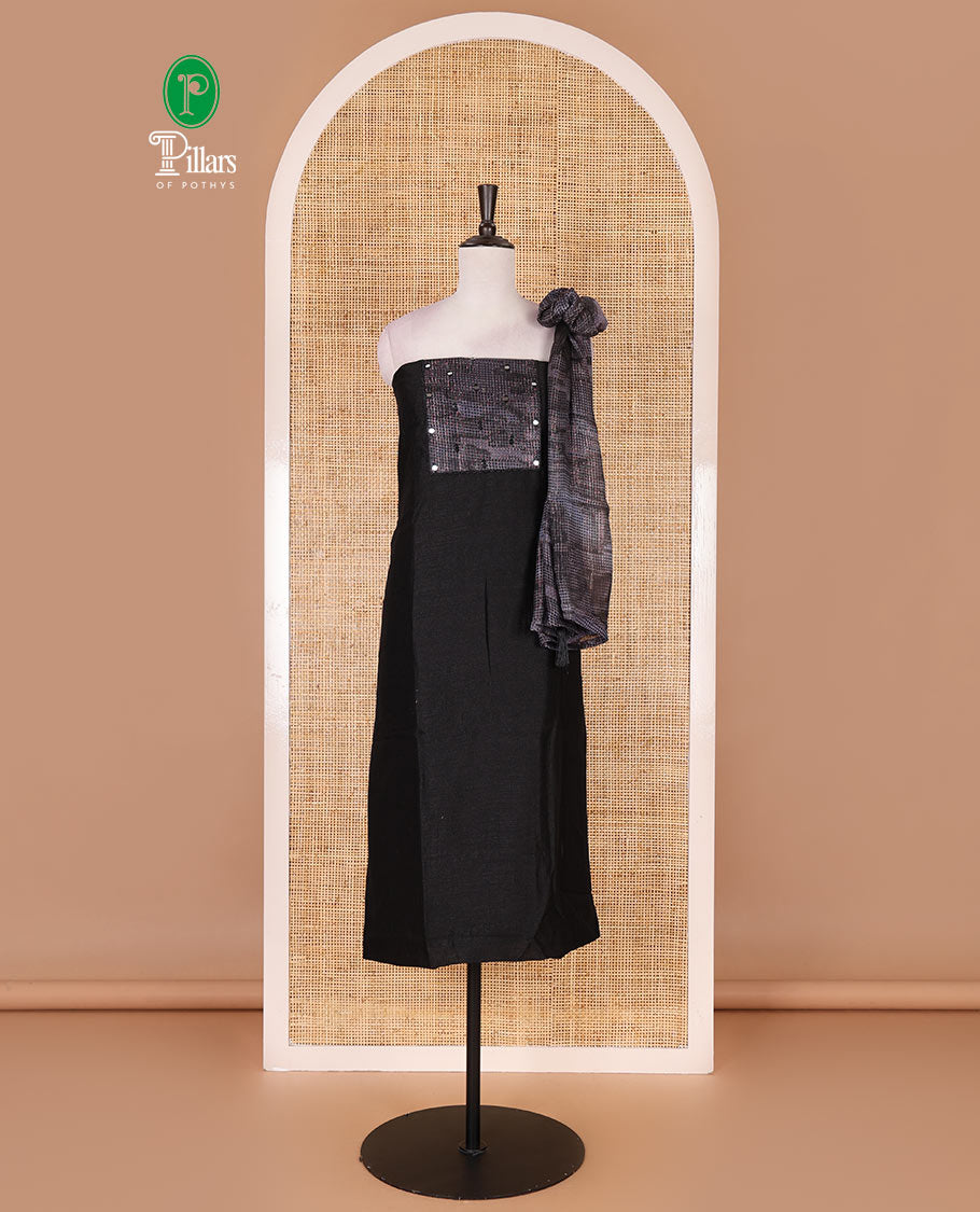 Black material chudidar set, abstract printed with mirrorwork vichitra silk top, santoon bottom, and abstract printed shimmer georgette dupatta
