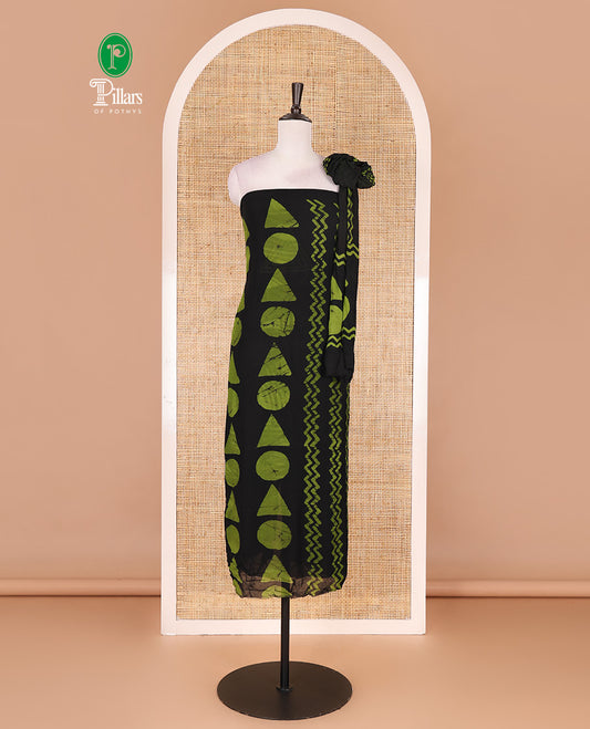 Black and green viscose georgette material churidar set, geometric shapes batik hand block printed top, plain bottom, and batik hand block printed dupatta