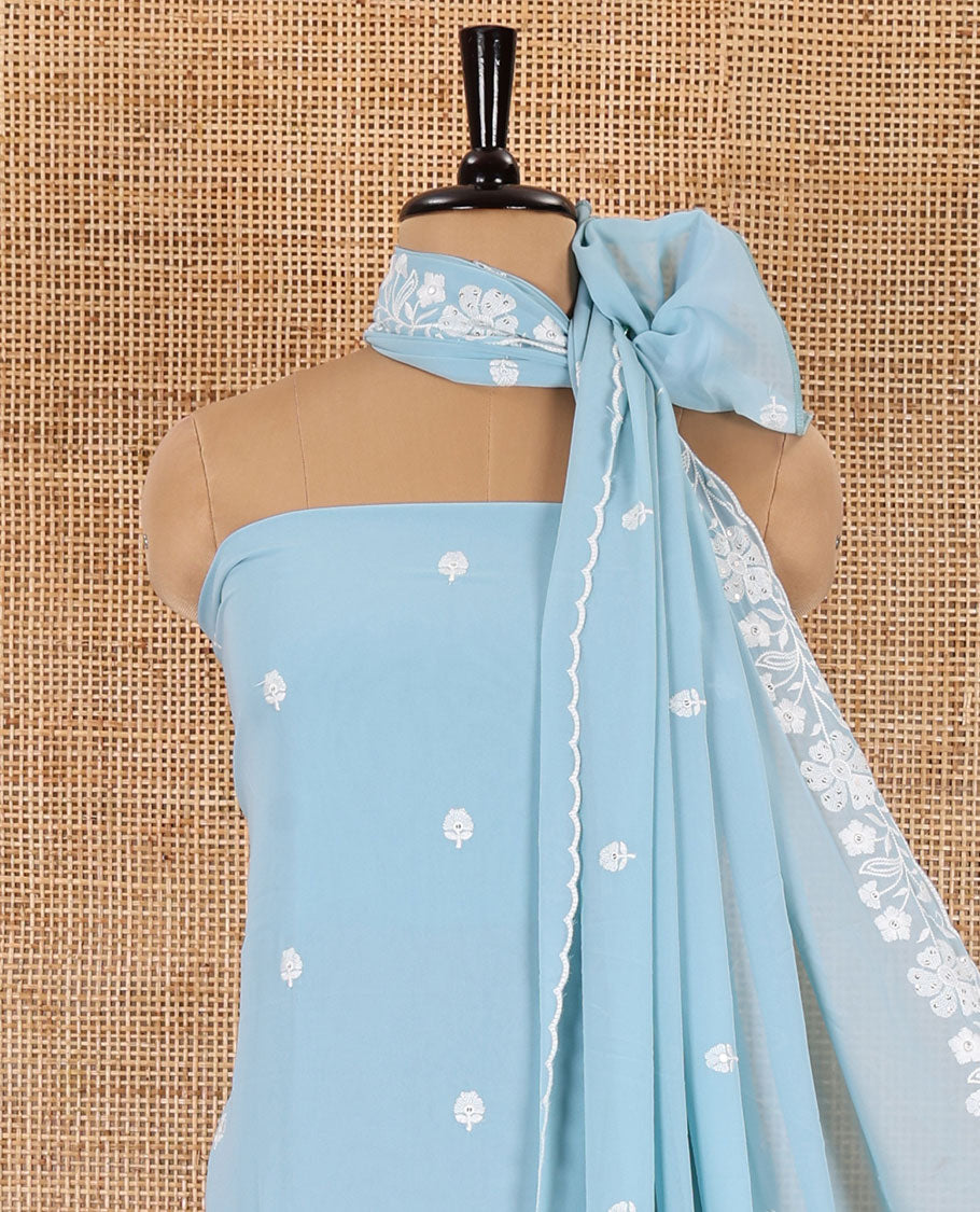 Blue material chudidar set, floral thread embroidered georgette top, plain bottom, and floral motifs embroidered scallop georgette dupatta
