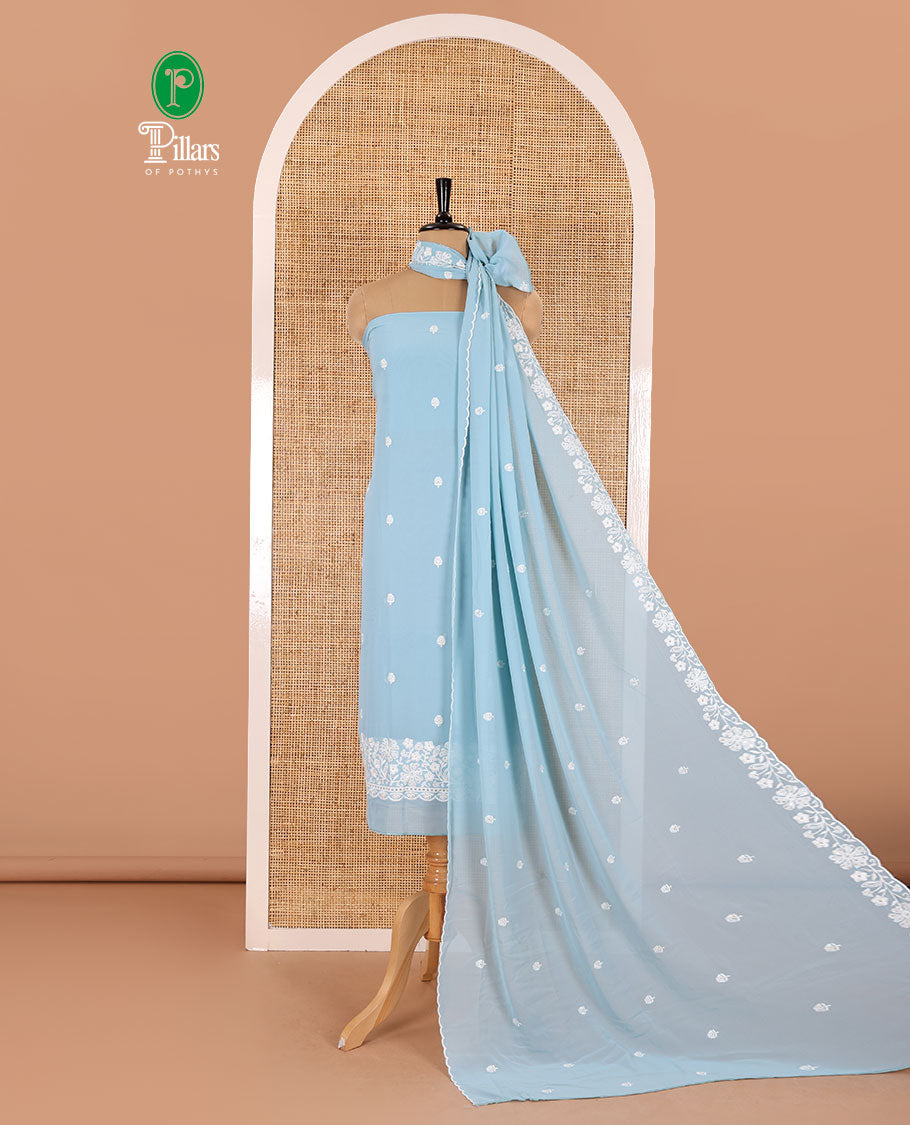 Blue material chudidar set, floral thread embroidered georgette top, plain bottom, and floral motifs embroidered scallop georgette dupatta