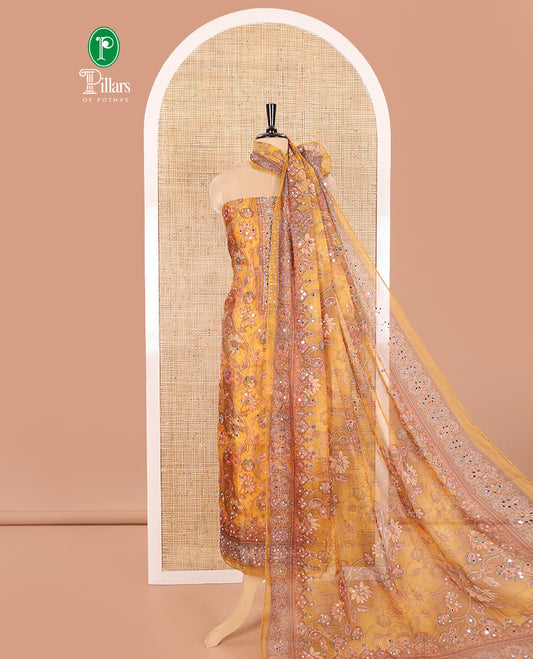 Mustard Material Chudidar Set Adorned with Floral Vine with Mirror Work Organza Top, Subtly Made Plain Santoon Bottom, and Organza Dupatta Featuring Floral Vine Print and Mirror Work